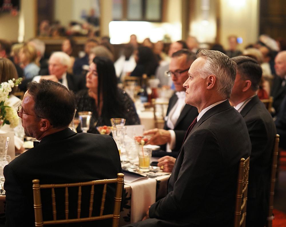 Group sitting at tables.